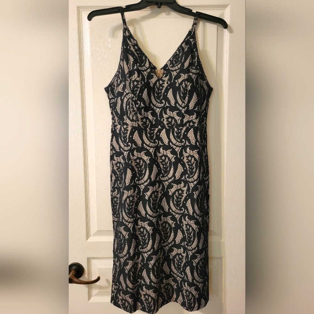 Black ant tan fitted spaghetti strip dress.
